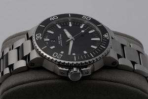 Swiss diver watch on steel bracelet photo