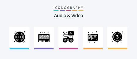 paquete de iconos de glifo 5 de audio y video que incluye película. cuenta regresiva. juego. grabadora. casete. diseño de iconos creativos vector