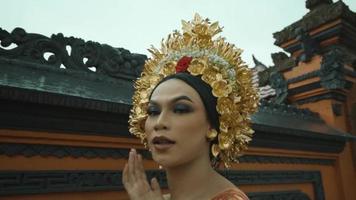 A Balinese Bride While wearing a traditional dress from Bali in the wedding ceremony video