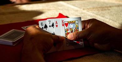 cards in hand, playing cards on weekends, parties, misfortunes,casino photo