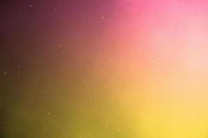Pink and gold background design texture, gold flecks on yellow pink colorful presentation or wall backdrop, for graphic design, website, banner photo