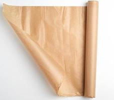 untwisted bundle of brown parchment baking paper photo