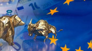 The gold bull bear on euro flag for business concept 3d rendering photo