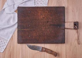 Empty old wooden kitchen cutting board photo