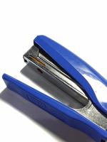 West Java, Indonesia on July 2022. Isolated white photo of a blue stapler.