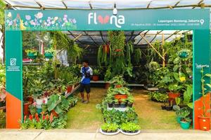 Jakarta, Indonesia in August 2022. Visitors who are lovers of flora and fauna visiting the Flona 2022 exhibition at the Banteng Field in Central Jakarta. photo