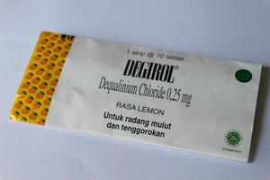 Jakarta, Indonesia in December 2022. Isolated white photo of Degirol Dequalinium Chloride 0.25 mg