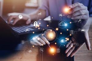 businessmen Fingerprint scanning and biometric authentication, processing of biometric for access personal data. surveillance and security scanning of digital programs cyber futuristic applications photo