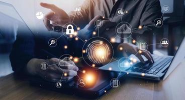 businessmen Fingerprint scanning and biometric authentication, processing of biometric for access personal data. surveillance and security scanning of digital programs cyber futuristic applications photo