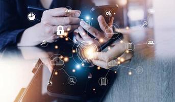 businessmen Fingerprint scanning and biometric authentication, processing of biometric for access personal data. surveillance and security scanning of digital programs cyber futuristic applications photo
