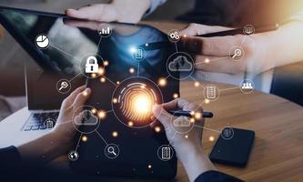 businessmen Fingerprint scanning and biometric authentication, processing of biometric for access personal data. surveillance and security scanning of digital programs cyber futuristic applications photo