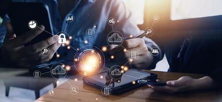 businessmen Fingerprint scanning and biometric authentication, processing of biometric for access personal data. surveillance and security scanning of digital programs cyber futuristic applications photo