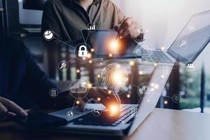 businessmen Fingerprint scanning and biometric authentication, processing of biometric for access personal data. surveillance and security scanning of digital programs cyber futuristic applications photo