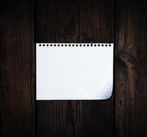 empty rectangular white sheet torn out of notepad photo