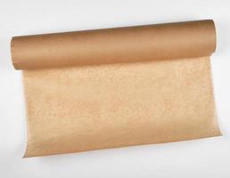 rolled brown parchment paper roll for baking photo