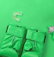 pair of leather green boxing gloves photo