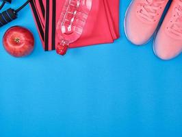 sportswear and pink sneakers with laces photo