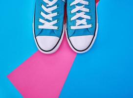 pair of blue textile sneakers photo