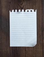 empty notepad paper attached with a button photo