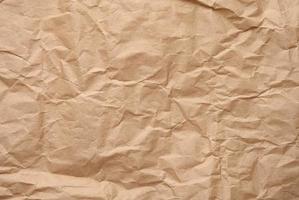 Texture of brown crumpled craft paper, full frame photo