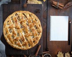 baked whole round apple pie photo