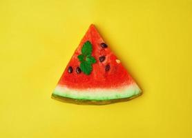 slice of ripe red watermelon with seeds photo