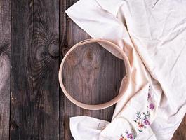 a round sieve for flour, gray wooden background photo