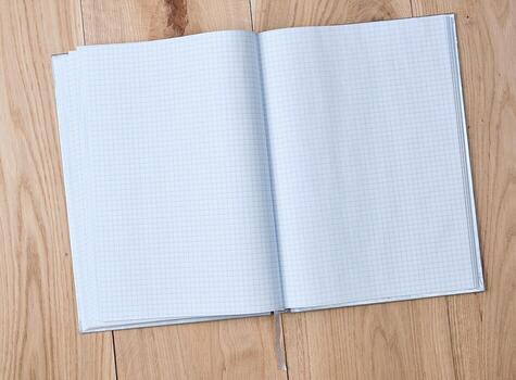 open notebook with a cell with empty sheets photo