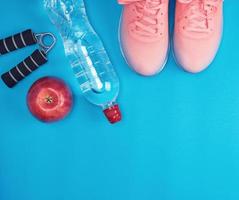 sportswear and pink sneakers with laces photo