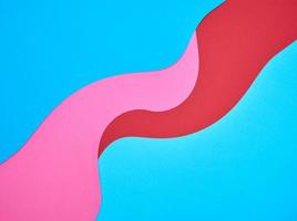 abstract color background of blue, red and pink wave shapes photo