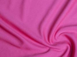 Pink velvet fabric texture used as background. Empty pink  fabric background of soft and smooth textile material. There is space for text photo