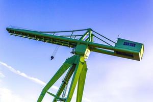 Green large ship crane container tower crane in Bremerhaven Germany. photo