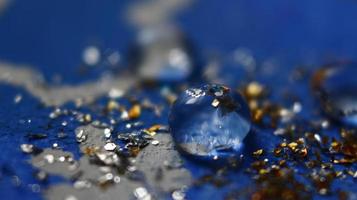 Close-up Of water drop with glitter on it in different colorful loghts in Karachi Pakistan 2022 photo