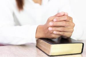 Woman praying in the morning. Christianity concept.  Faith hope love concept. photo