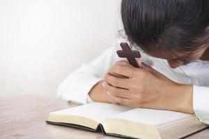 Religious young woman praying to God in the morning, spirtuality and religion, Religious concepts photo