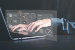 man check mark about exploring topics,In the virtual form check sheet,checklist ideas, checkbox to conduct opinion and quality surveys or satisfaction,Connect and work with modern wireless technology photo