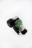 Cigarette lighter with green backlight. Spare part for the car. The electric cigarette lighter is disassembled. photo
