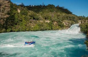 Taupo, New Zealand - April 26 2017 - Tourist adventure in Huka Falls with Huka jet boat the most famous iconic thriller activity in Taupo, New Zealand. photo