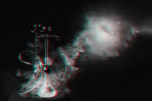 Hookah, shisha on a smoky black background with smoke. Glitch, black and white. Place for your text photo