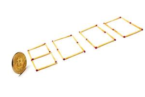 Golden bitcoin on isolate white background concept mining 8000 photo