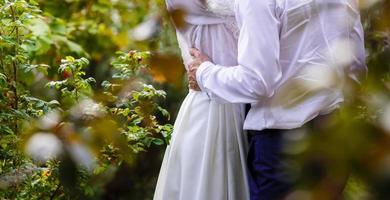 Luxury married wedding couple bride and groom posing in park autumn photo