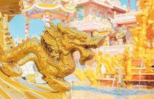 Ang Silla,Chonburi,Thailand -  January 14, 2023 Dragon statue is a beautiful Thai and Chinese architecture of Nachas sa thai chute shrine, naja shrine, najasaataichue, nezha shrine chinese temple. photo