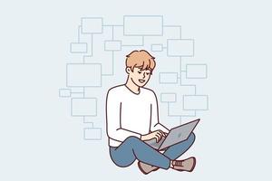 Young man programmer sits cross-legged on floor with laptop on lap and creates web application. Guy IT developer thinks over flowchart modern website or blockchain project. Flat vector illustration