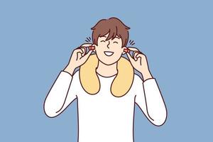 Happy man uses earplugs and neck pillow to rest during long journey on bus or plane. Positive guy traveler is in good mood after getting enough sleep on train. Flat vector illustration