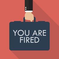 Businessman hand holding briefcase with words You are fired vector