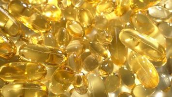 vitamine d, capsule omega 3, macro video