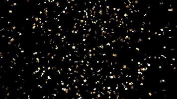 fliegendes goldenes konfetti isoliert auf schwarzem hintergrund partykonzept