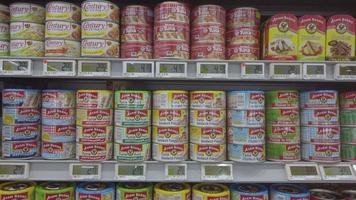 A wall of tuna cans video