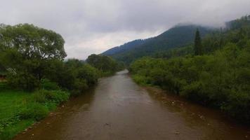 Aerial View. Flying over the beautiful mountain River. Aerial camera shot. Landscape panorama. video