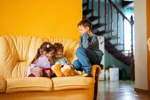 sit on a leather sofa in the living room photo